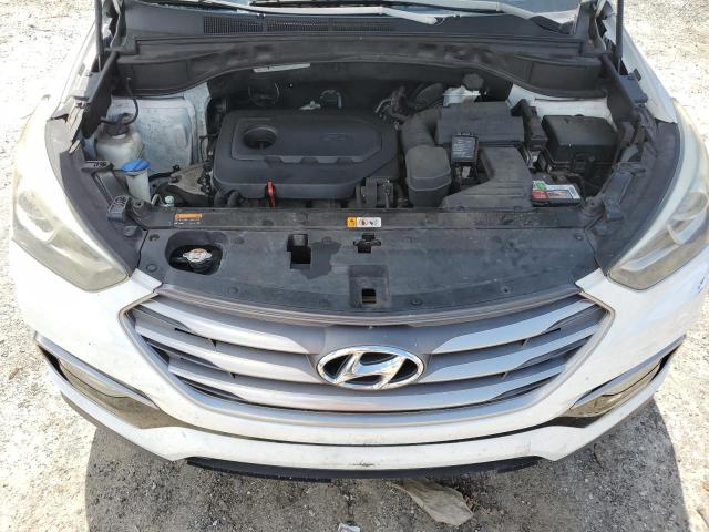 Photo 12 from auction – 2017 HYUNDAI SANTA FE S with VIN 5NMZU3LB8HH038372
