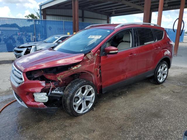 FORD ESCAPE TIT 2017 with VIN 1FMCU0J9XHUC84834 - Photo from auction