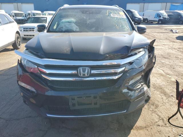 Photo 5 from auction – 2017 HONDA PILOT TOUR with VIN 5FNYF6H9XHB501675