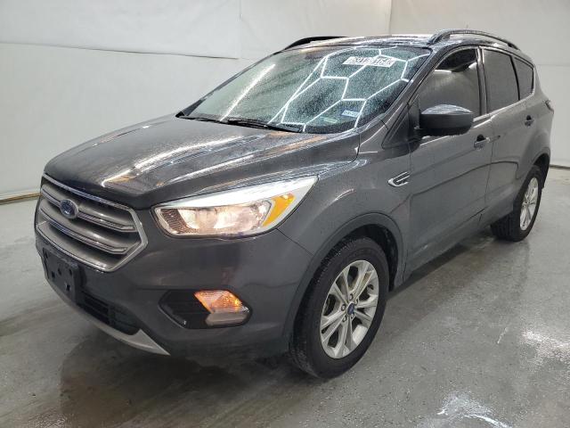 FORD ESCAPE SE 2018 with VIN 1FMCU0GD4JUC90842 - Photo from auction