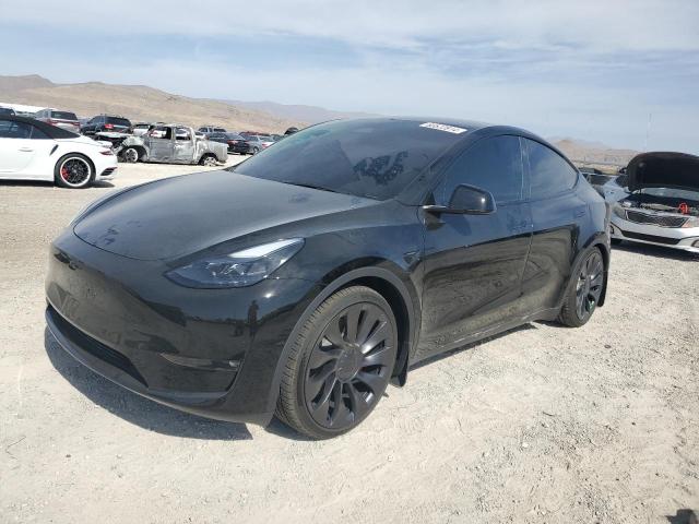 TESLA MODEL Y 2023 with VIN 7SAYGDEF2PF938051 - Photo from auction