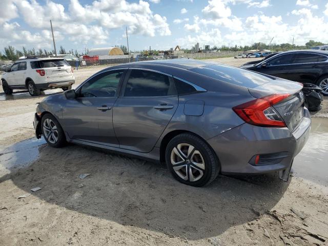 Photo 2 from auction – 2016 HONDA CIVIC LX with VIN 19XFC2F52GE038587