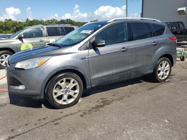 FORD ESCAPE TIT 2014 with VIN 1FMCU0J93EUE57802 - Photo from auction