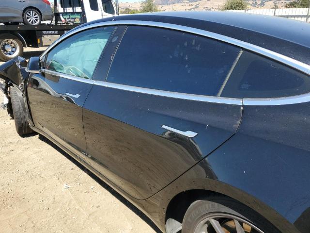 Photo 8 from auction – 2019 TESLA MODEL 3 with VIN 5YJ3E1EA2KF397656