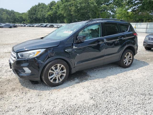 FORD ESCAPE SE 2018 with VIN 1FMCU9GD9JUD24908 - Photo from auction