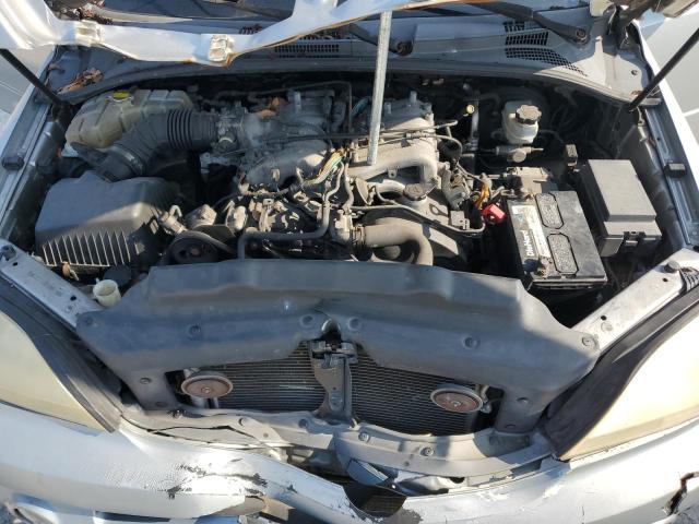Photo 12 from auction – 2003 KIA SORENTO EX with VIN KNDJC733035093409