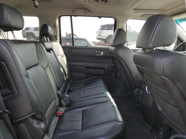 Photo 11 from auction – 2010 HONDA PILOT TOUR with VIN 5FNYF4H93AB502323