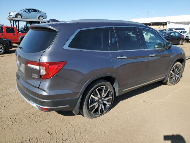 Photo 3 from auction – 2019 HONDA PILOT TOUR with VIN 5FNYF6H63KB033429