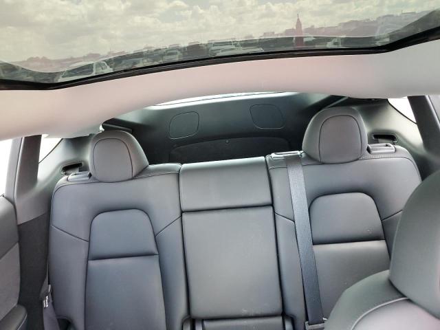 Photo 10 from auction – 2023 TESLA MODEL Y with VIN 7SAYGDEE0PA053108