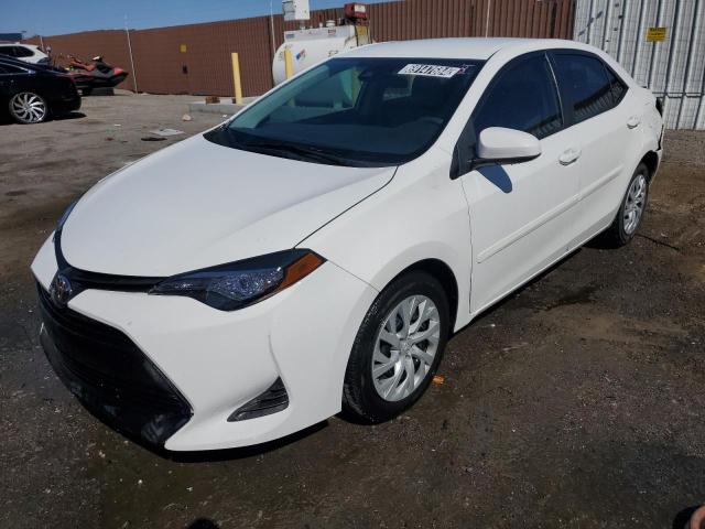 TOYOTA COROLLA L 2019 with VIN 5YFBURHE4KP861014 - Photo from auction