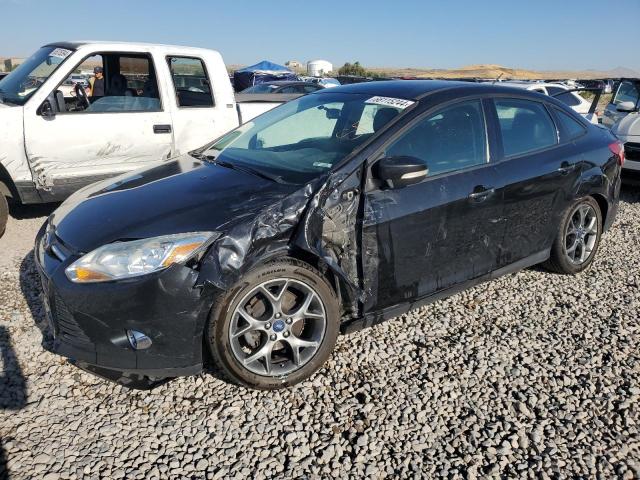 FORD FOCUS SE 2014 con VIN 1FADP3F21EL137323 - Foto de la subasta