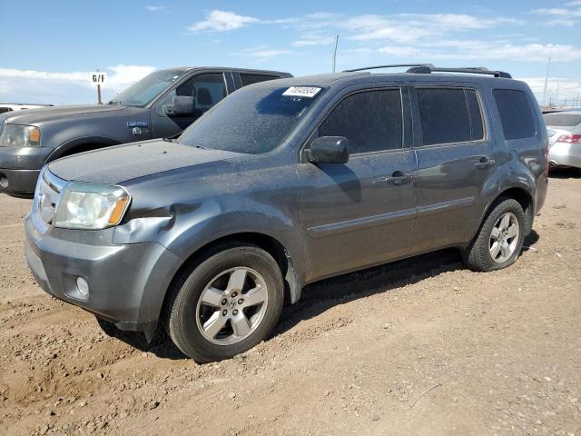 HONDA PILOT EXL 2011 with VIN 5FNYF4H52BB020019 - Photo from auction