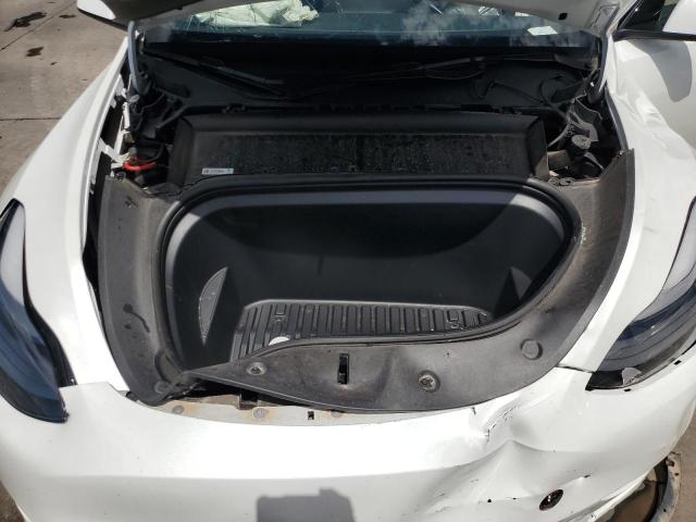 Photo 12 from auction – 2023 TESLA MODEL Y with VIN 7SAYGAEE5PF592387