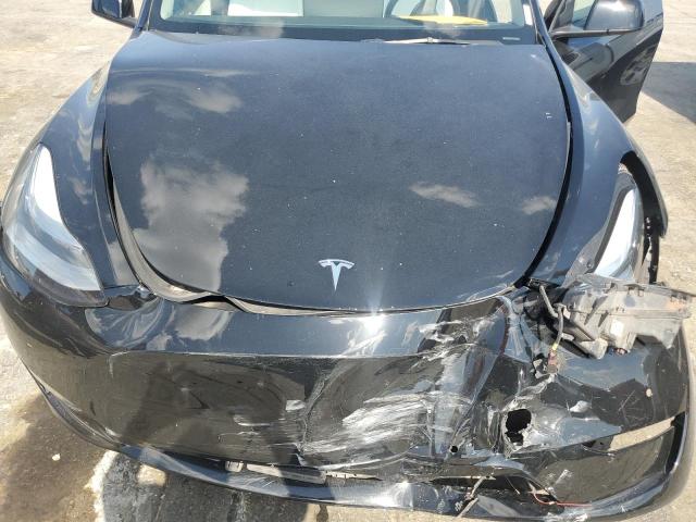 Photo 12 from auction – 2022 TESLA MODEL Y with VIN 7SAYGAEEXNF465311