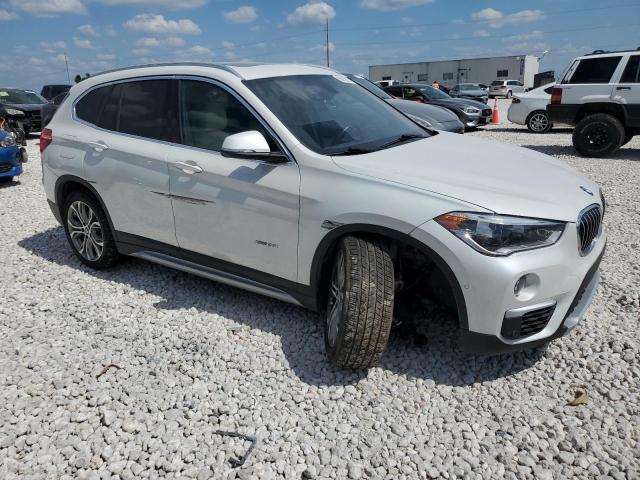 Photo 4 from auction – 2017 BMW X1 XDRIVE2 with VIN WBXHT3C3XH5F73543