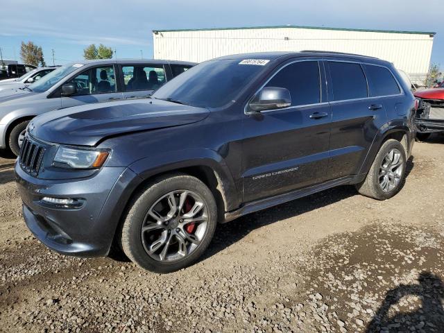 JEEP GRAND CHER 2014 with VIN 1C4RJFDJ9EC512579 - Photo from auction