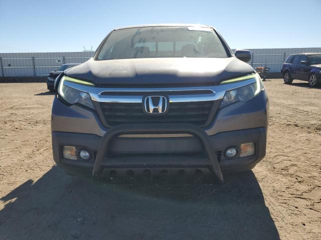 Photo 5 from auction – 2019 HONDA RIDGELINE with VIN 5FPYK3F63KB010639