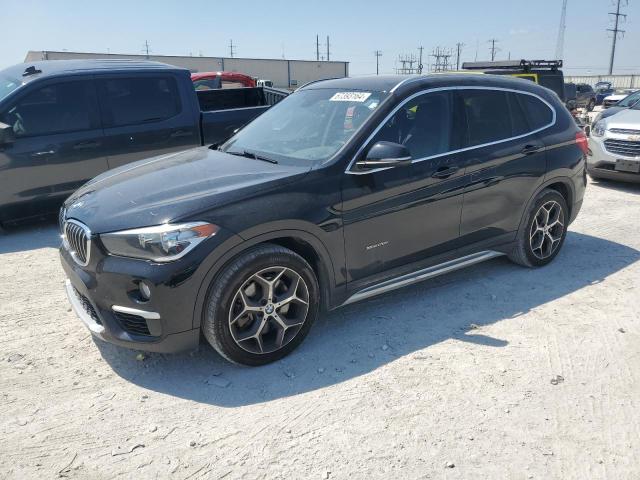 BMW X1 XDRIVE2 2016 with VIN WBXHT3C33G5F63600 - Photo from auction