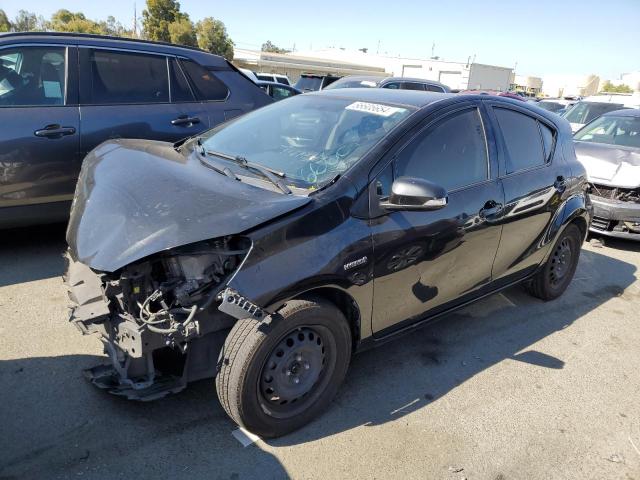 TOYOTA PRIUS C 2015 with VIN JTDKDTB34F1579504 - Photo from auction