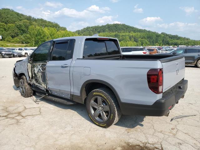 Photo 2 from auction – 2023 HONDA RIDGELINE with VIN 5FPYK3F50PB057271