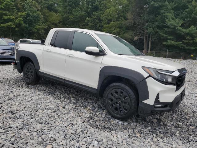 Photo 4 from auction – 2023 HONDA RIDGELINE with VIN 5FPYK3F5XPB028344