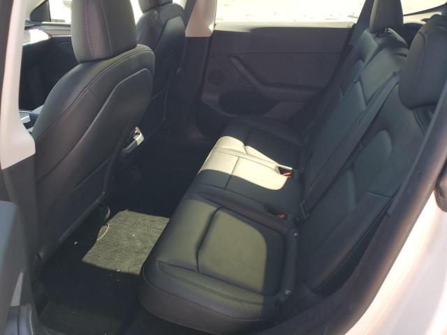 Photo 11 from auction – 2023 TESLA MODEL Y with VIN 7SAYGDEE7PF590058
