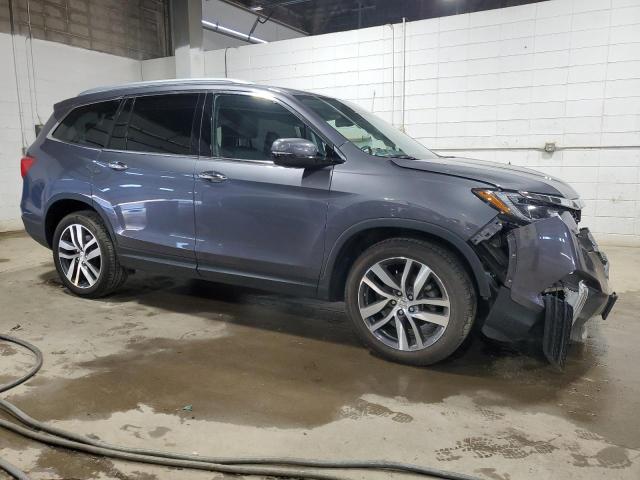 Photo 4 from auction – 2018 HONDA PILOT ELIT with VIN 5FNYF6H0XJB032028