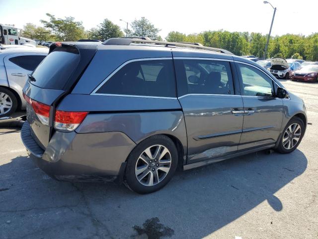 Photo 3 from auction – 2014 HONDA ODYSSEY TO with VIN 5FNRL5H94EB049693