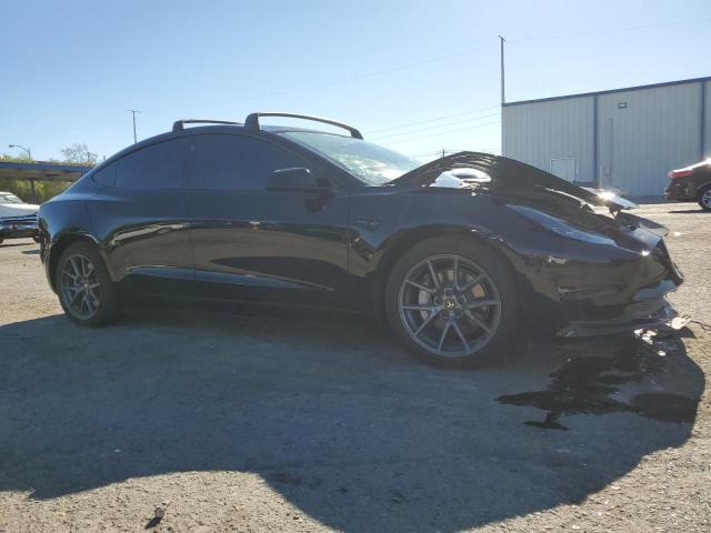 Photo 4 from auction – 2021 TESLA MODEL 3 with VIN 5YJ3E1EB6MF052044