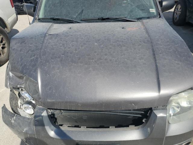Photo 12 from auction – 2005 FORD ESCAPE LIM with VIN 1FMCU94125KA83351