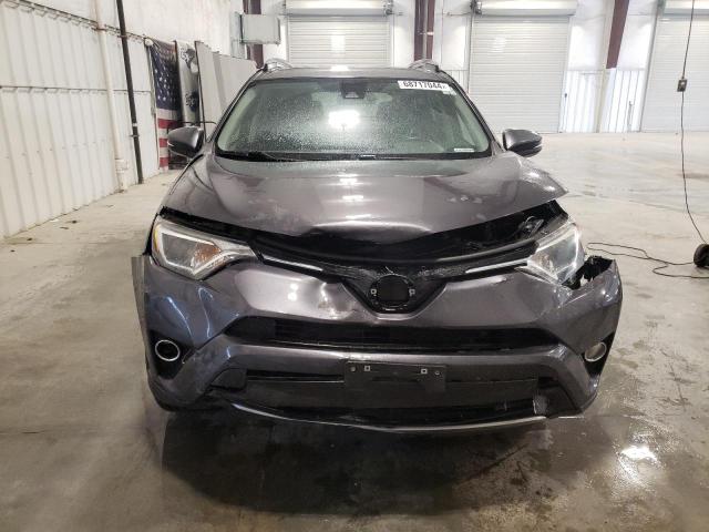 Photo 5 from auction – 2017 TOYOTA RAV4 XLE with VIN JTMRFREV8HJ132332