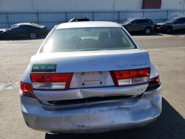 Photo 6 from auction – 2004 HONDA ACCORD LX with VIN JHMCM56484C026552