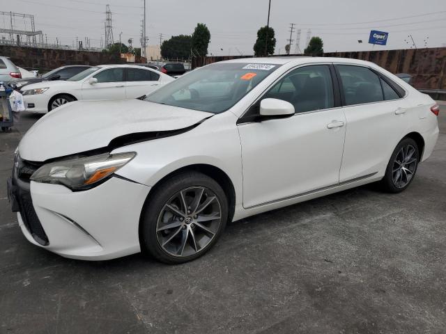 TOYOTA CAMRY LE 2016 with VIN 4T1BF1FK3GU256668 - Photo from auction