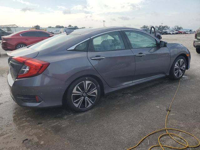 Photo 3 from auction – 2016 HONDA CIVIC EX with VIN 2HGFC1F36GH649124