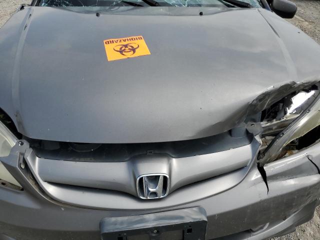 Photo 11 from auction – 2004 HONDA CIVIC LX with VIN 2HGES16564H540237