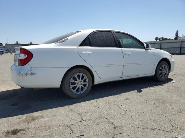 Photo 3 from auction – 2002 TOYOTA CAMRY LE with VIN JTDBE32KX20010080