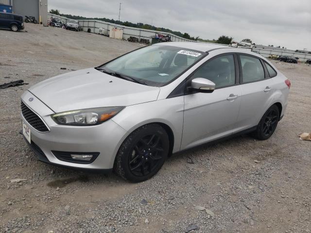 FORD FOCUS SE 2016 with VIN 1FADP3F26GL374070 - Photo from auction