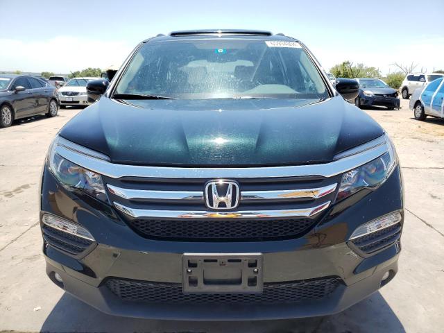 Photo 5 from auction – 2016 HONDA PILOT EXLN with VIN 5FNYF5H75GB009949