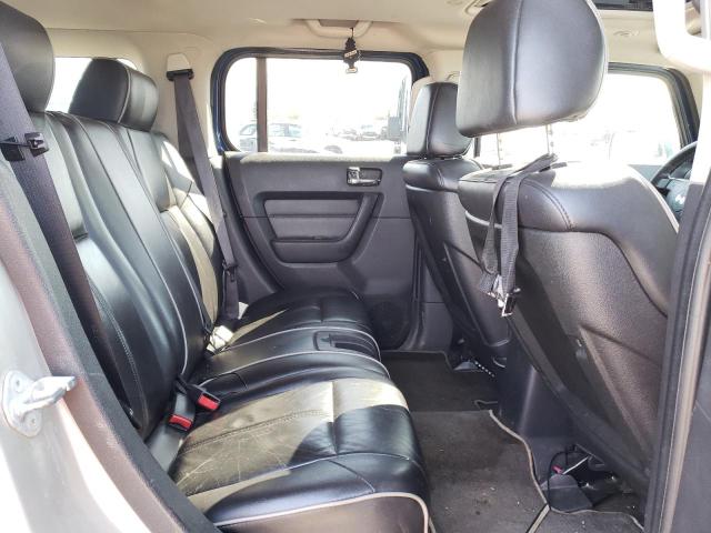 Photo 11 from auction – 2006 HUMMER H3 with VIN 5GTDN136168132745