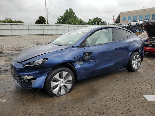 TESLA MODEL Y 2023 with VIN 7SAYGDEEXPF948883 - Photo from auction