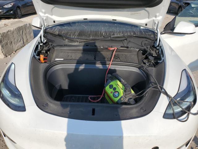 Photo 11 from auction – 2023 TESLA MODEL Y with VIN 7SAYGDEE7PF803963