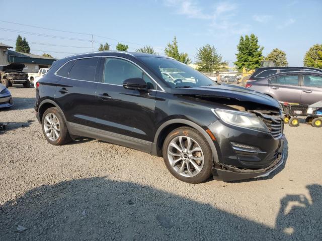 Photo 4 from auction – 2015 LINCOLN MKC with VIN 5LMTJ2AH9FUJ30699