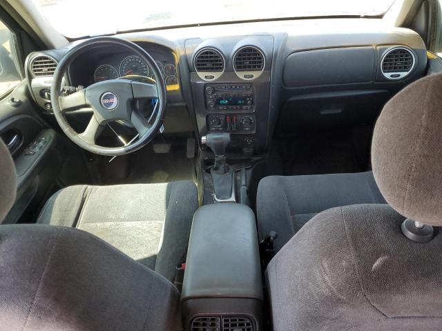 Photo 8 from auction – 2006 GMC ENVOY with VIN 1GKDS13S562162853