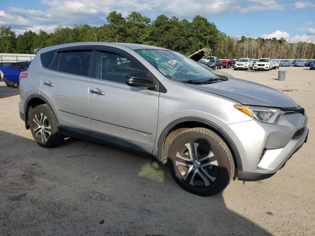 Photo 4 from auction – 2018 TOYOTA RAV4 LE with VIN 2T3BFREV8JW785705