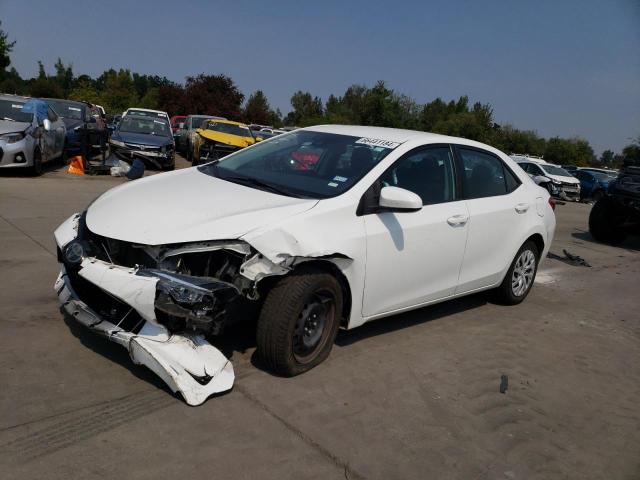 TOYOTA COROLLA L 2019 with VIN 5YFBURHE1KP870432 - Photo from auction