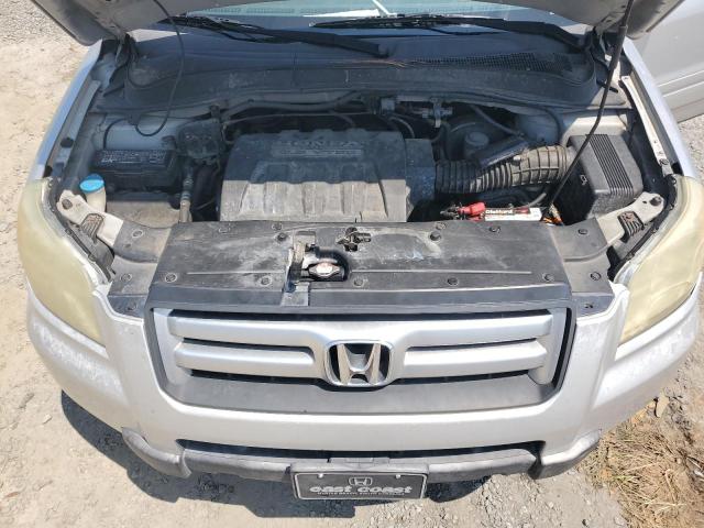 Photo 12 from auction – 2006 HONDA PILOT EX with VIN 5FNYF18556B002277