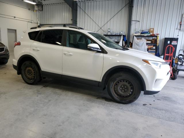 Photo 4 from auction – 2017 TOYOTA RAV4 LE with VIN 2T3BFREV8HW642229