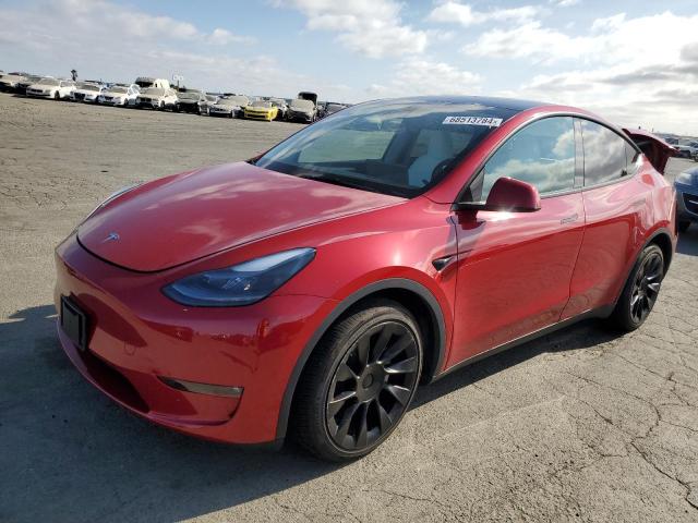 TESLA MODEL Y 2023 with VIN 7SAYGAEE0PF740624 - Photo from auction