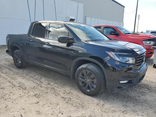 Photo 4 from auction – 2023 HONDA RIDGELINE with VIN 5FPYK3F10PB049216