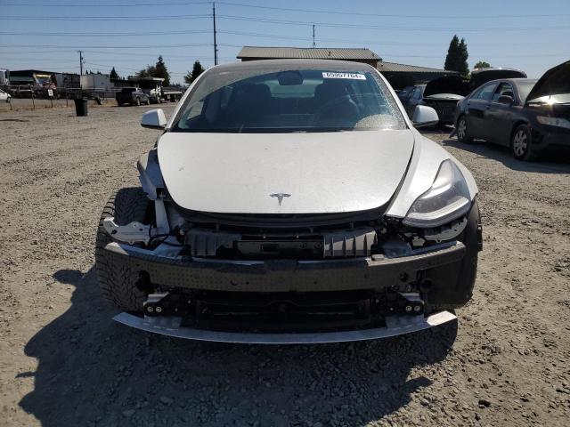 Photo 5 from auction – 2022 TESLA MODEL 3 with VIN 5YJ3E1EB2NF127663